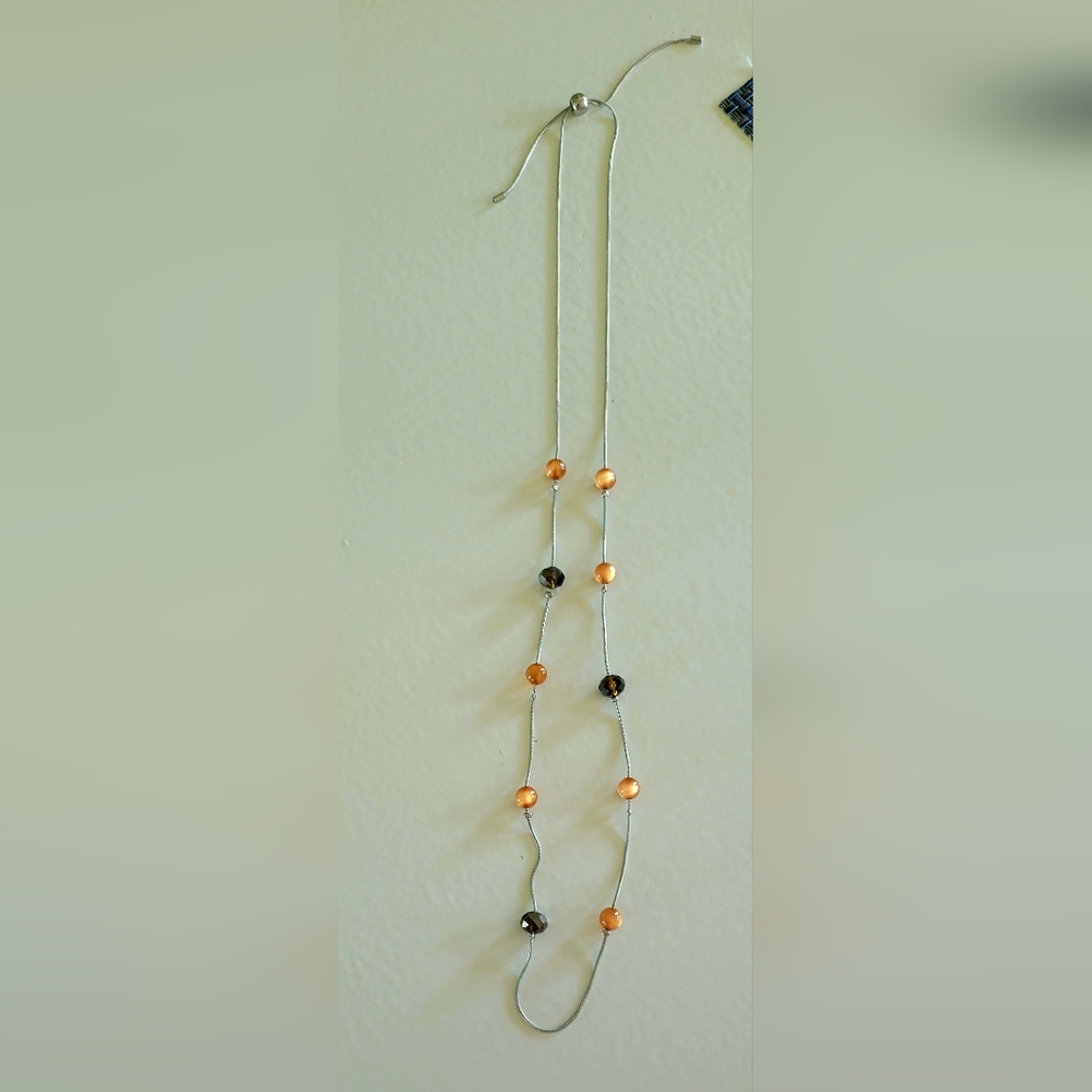 Elegant Silver Necklace with Orange and Dark Brown Beads